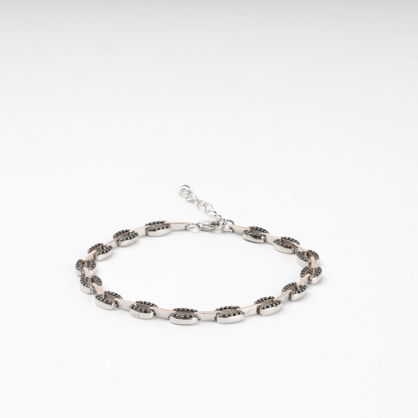 Two-tone black zirconia bracelet arranged in a circle — Kabluchka
