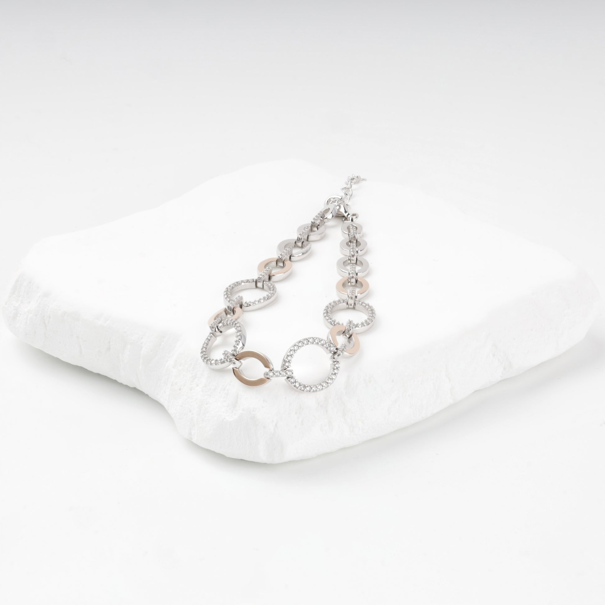 Two-tone cubic zirconia bracelet on white display — Kabluchka