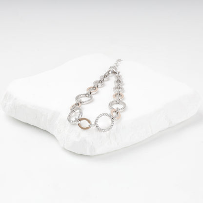Two-tone cubic zirconia bracelet on white display — Kabluchka