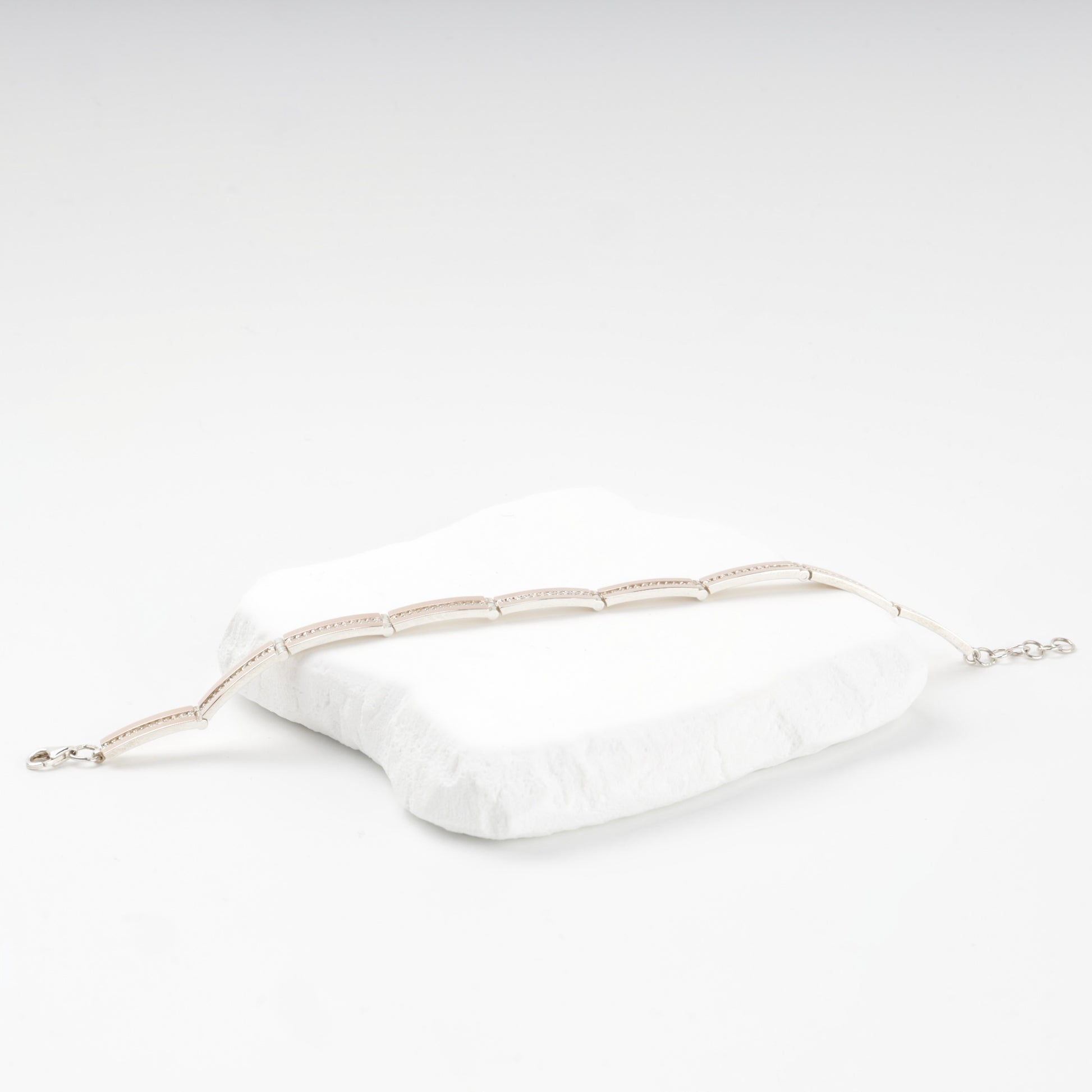 Mixed-metal link bracelet with cubic zirconia — angled view — Kabluchka