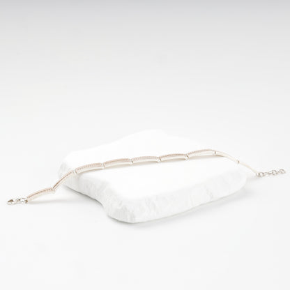 Mixed-metal link bracelet with cubic zirconia — angled view — Kabluchka