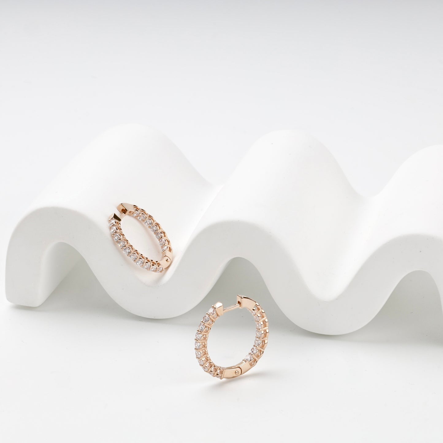 Inside-out stone-set hoop earrings, open closure view