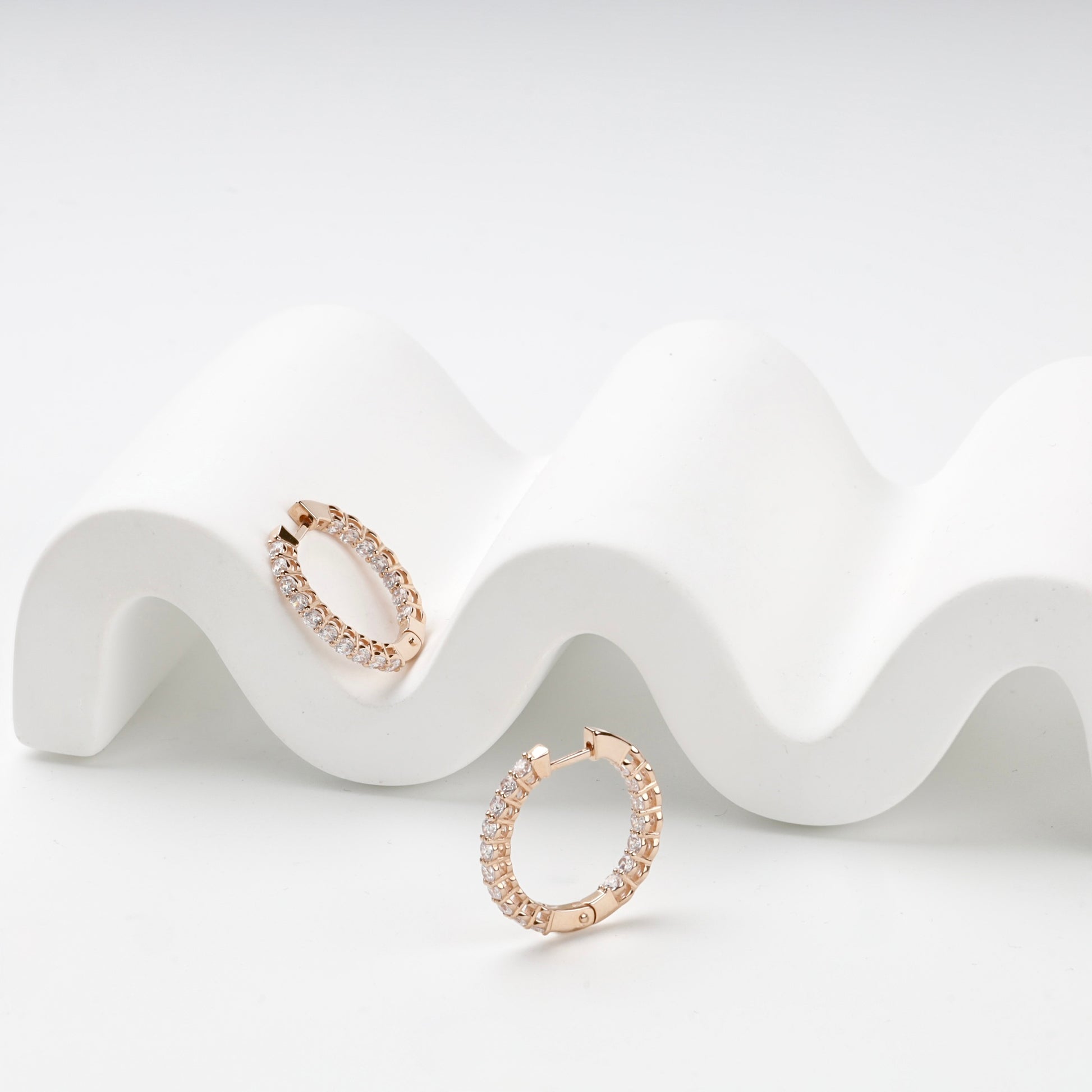Inside-out stone-set hoop earrings, open closure view