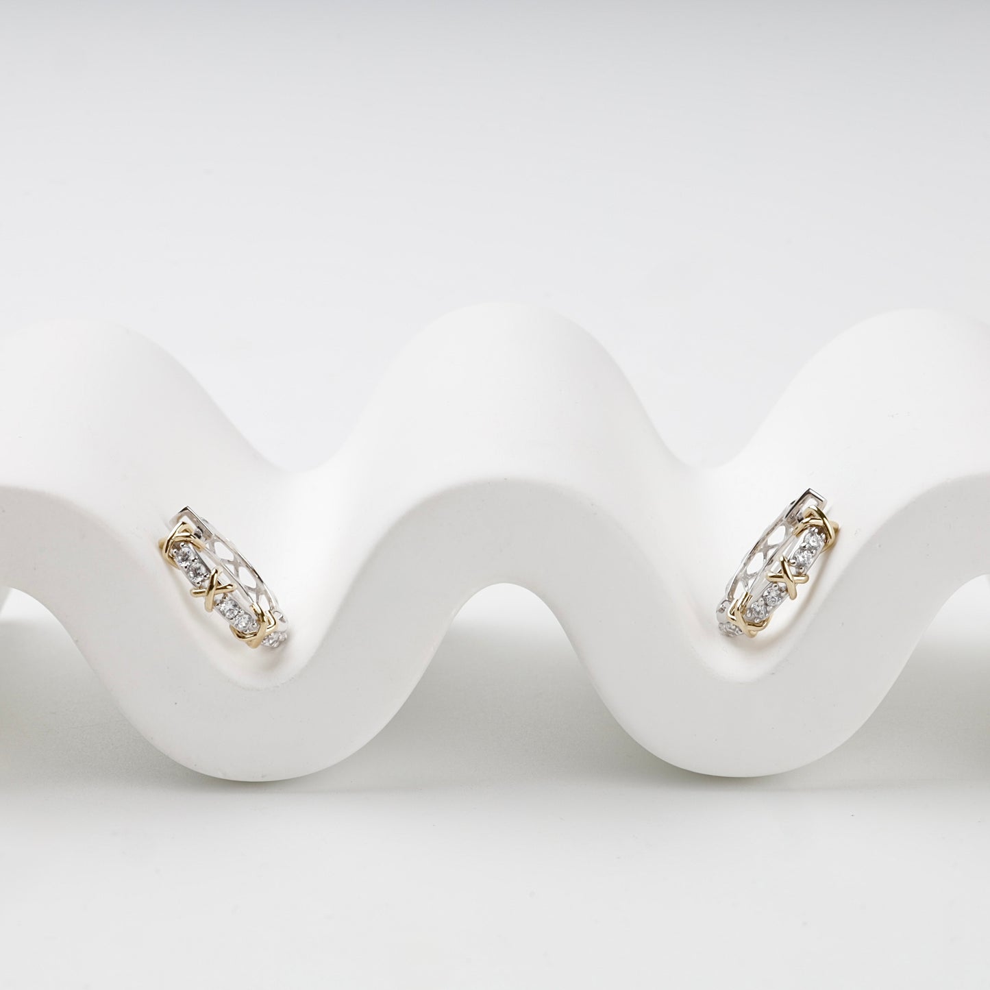 Two-tone Gold 14K cubic zirconia X huggie earrings