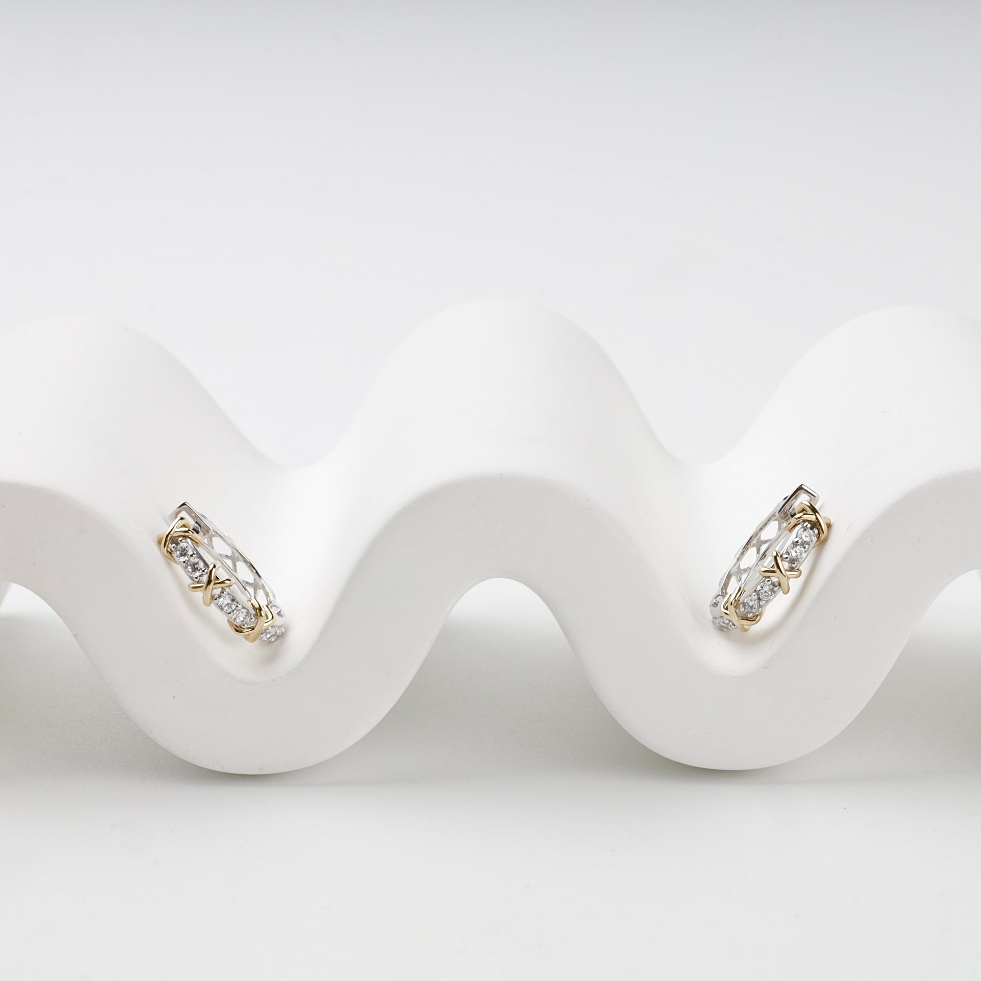 Two-tone Gold 14K cubic zirconia X huggie earrings