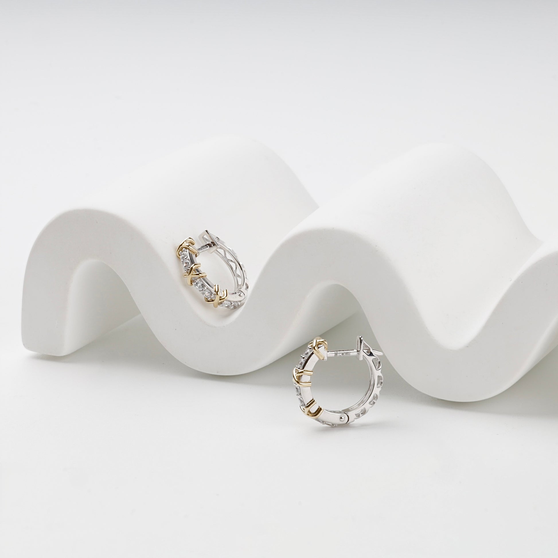 Cubic zirconia X huggies with hinged posts