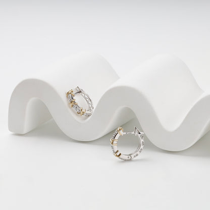 Cubic zirconia X huggies with hinged posts