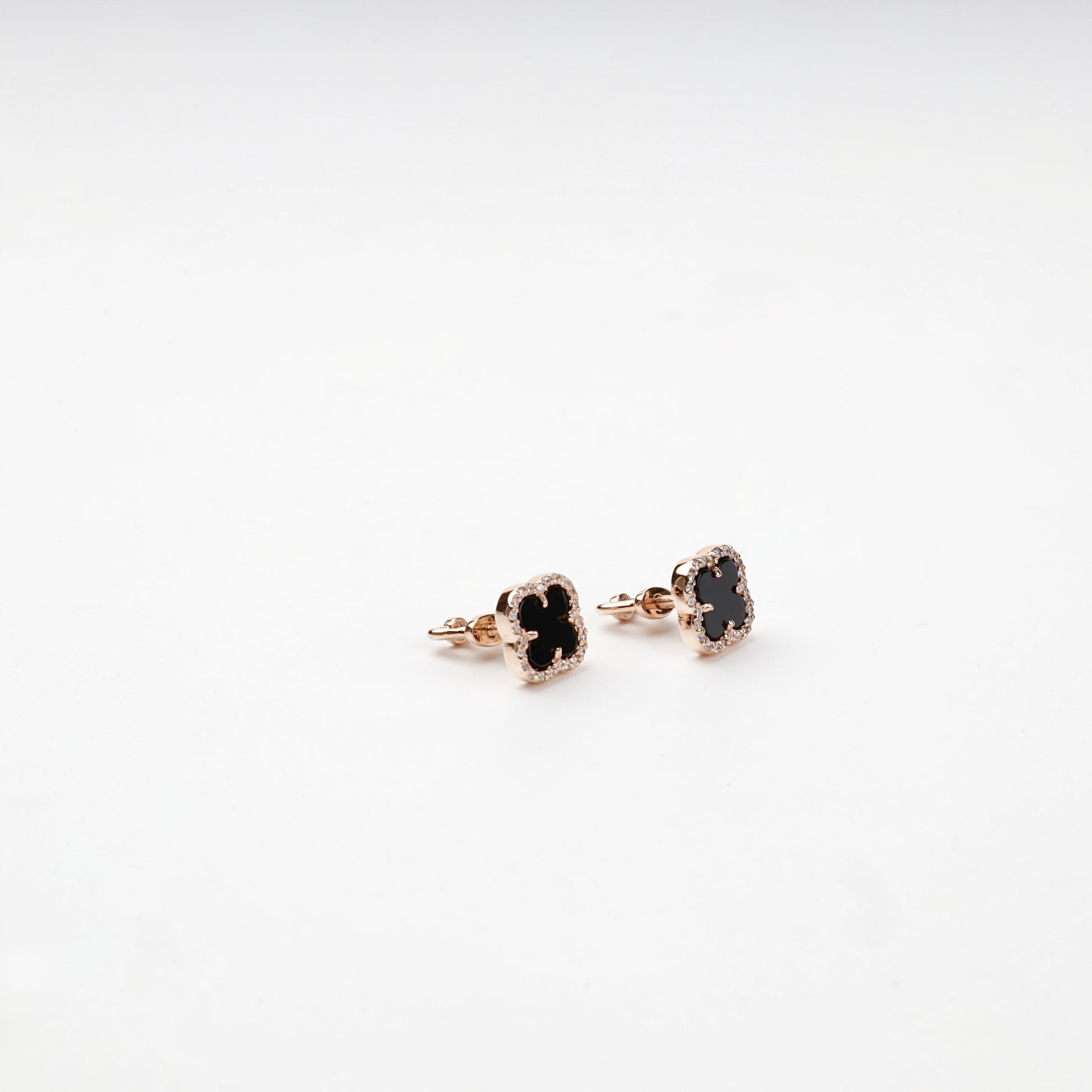 Rose Gold 14K clover stud earrings — angled pair view — Kabluchka