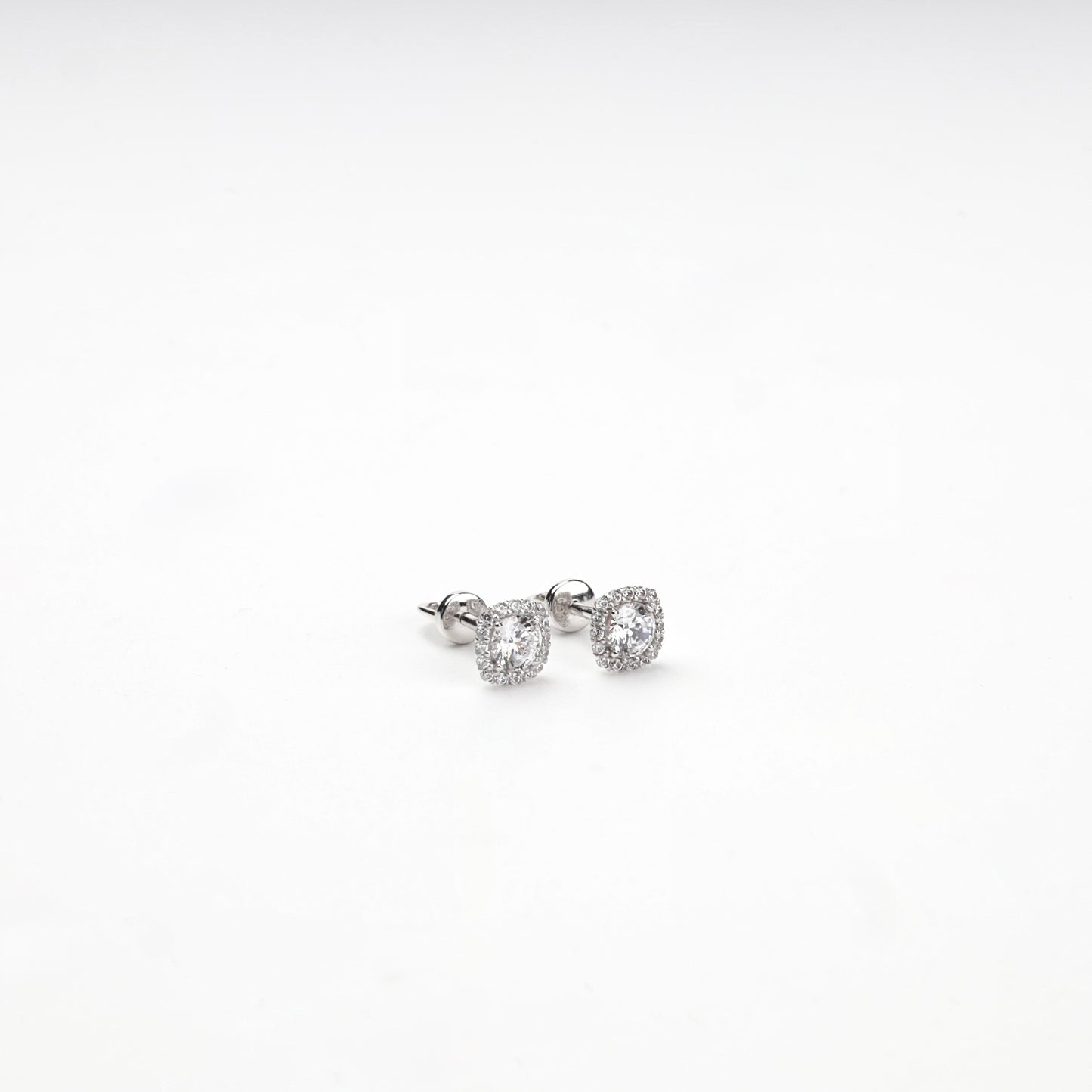 White Gold halo stud earrings with screw-back closures