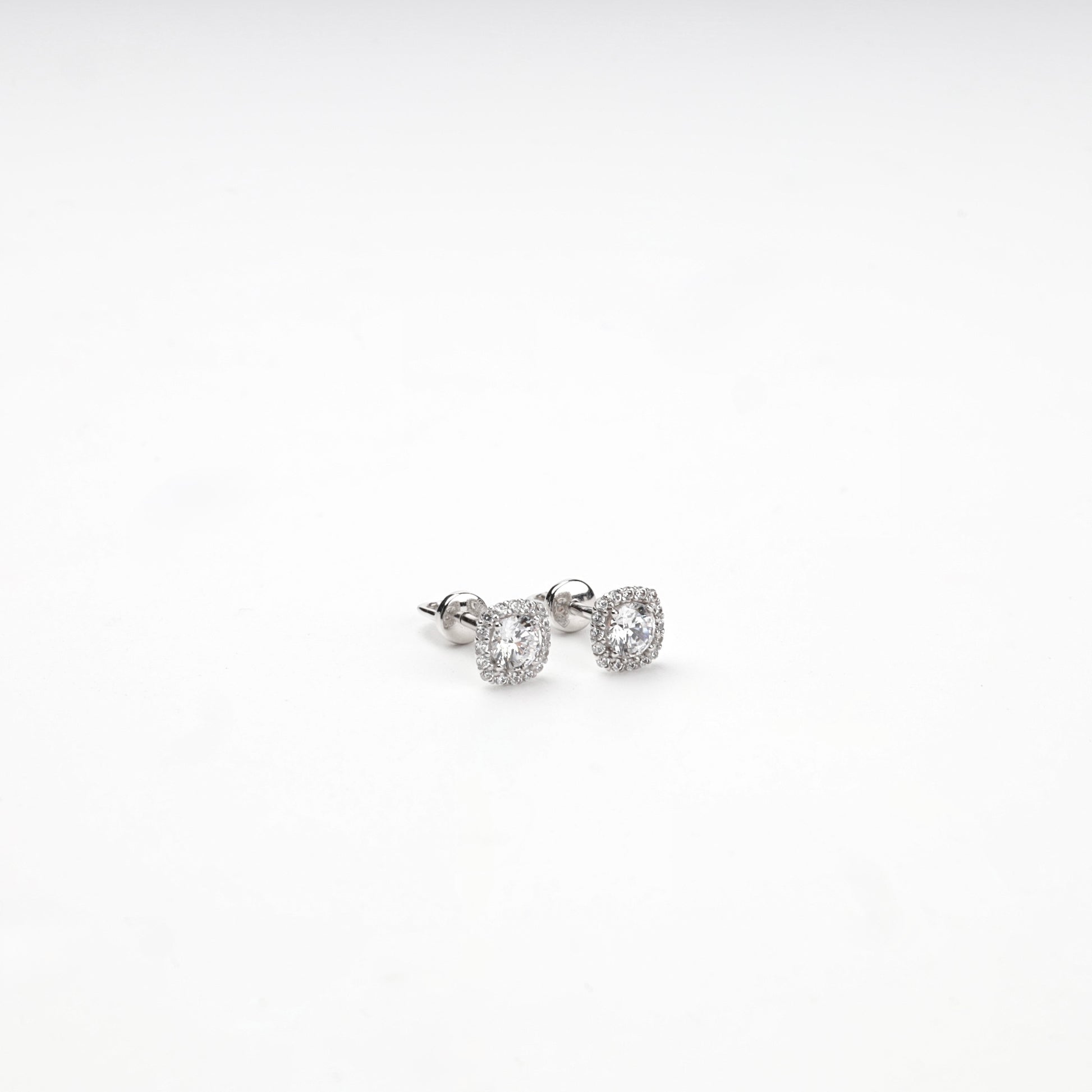 White Gold halo stud earrings with screw-back closures