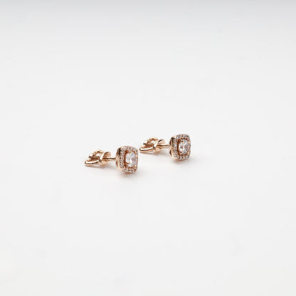 Rose Gold 14K cubic zirconia square halo stud earrings — angled pair view — Kabluchka