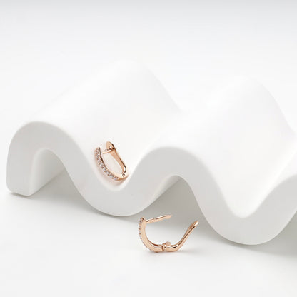 Cubic zirconia huggie earrings with English-lock closure — Kabluchka