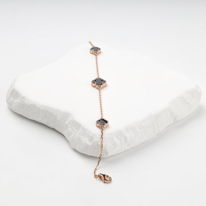 Three-clover rose gold onyx bracelet, full view — Kabluchka