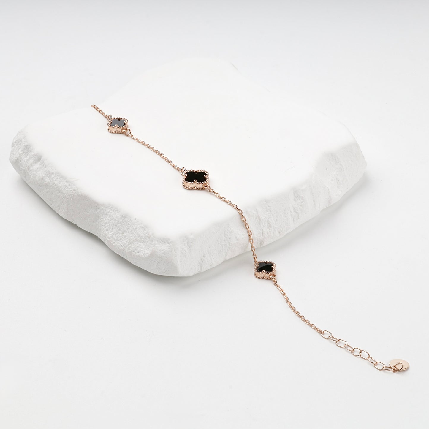 Black onyx clover bracelet on display — Kabluchka