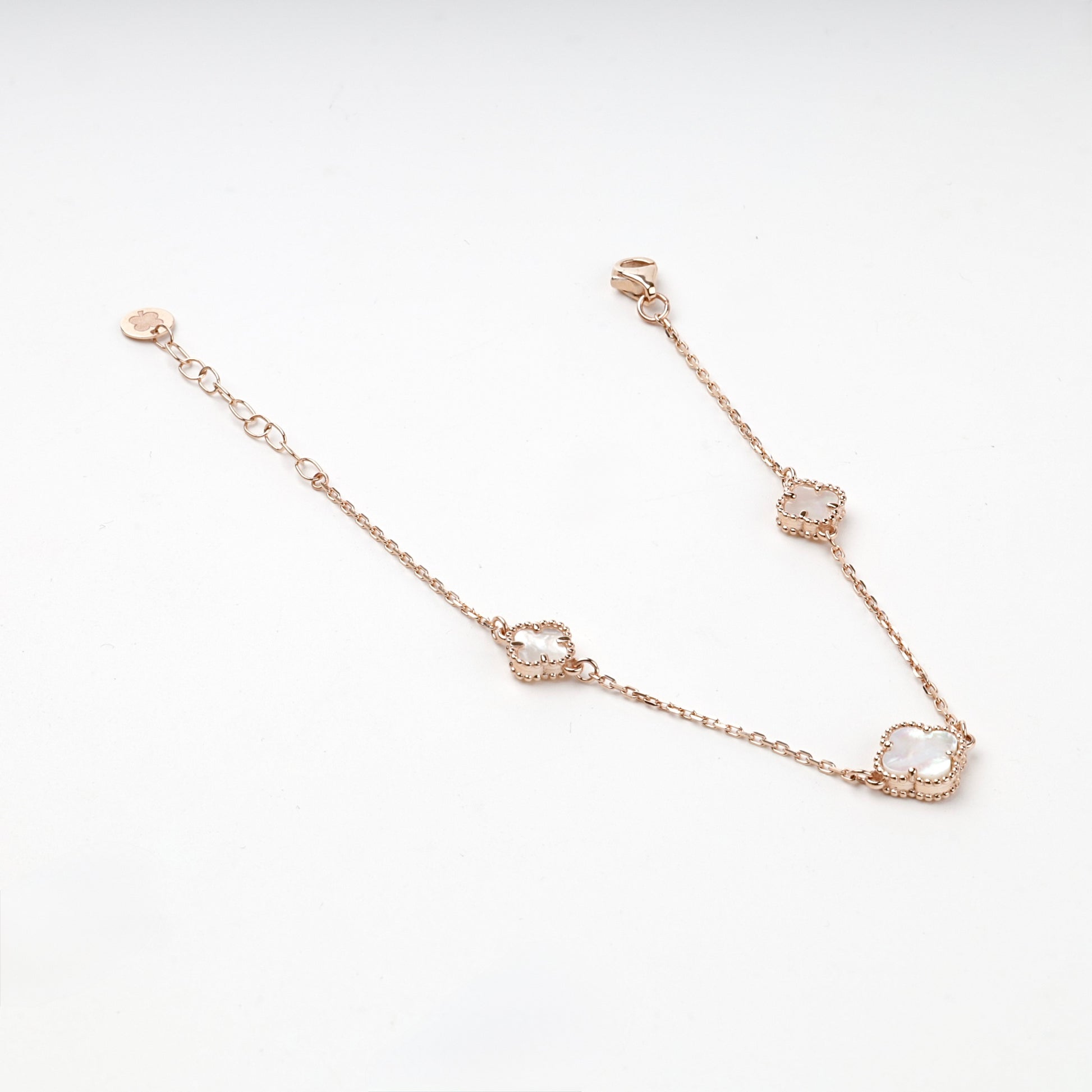 Three-clover rose gold station bracelet, full view — Kabluchka