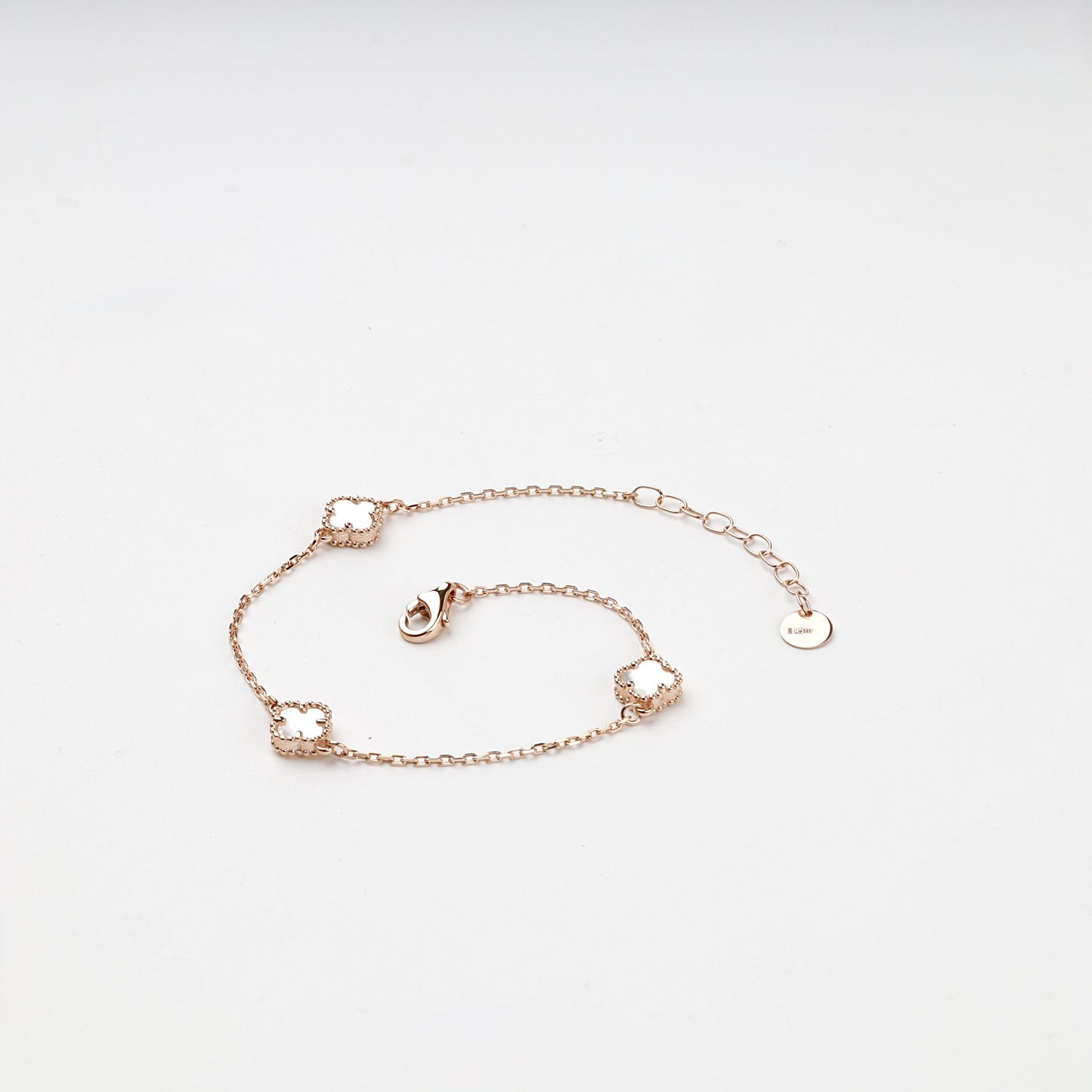 Fine rose gold bracelet with three clover stations — Kabluchka