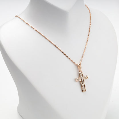 Orthodox crucifix pendant shown with a styling chain