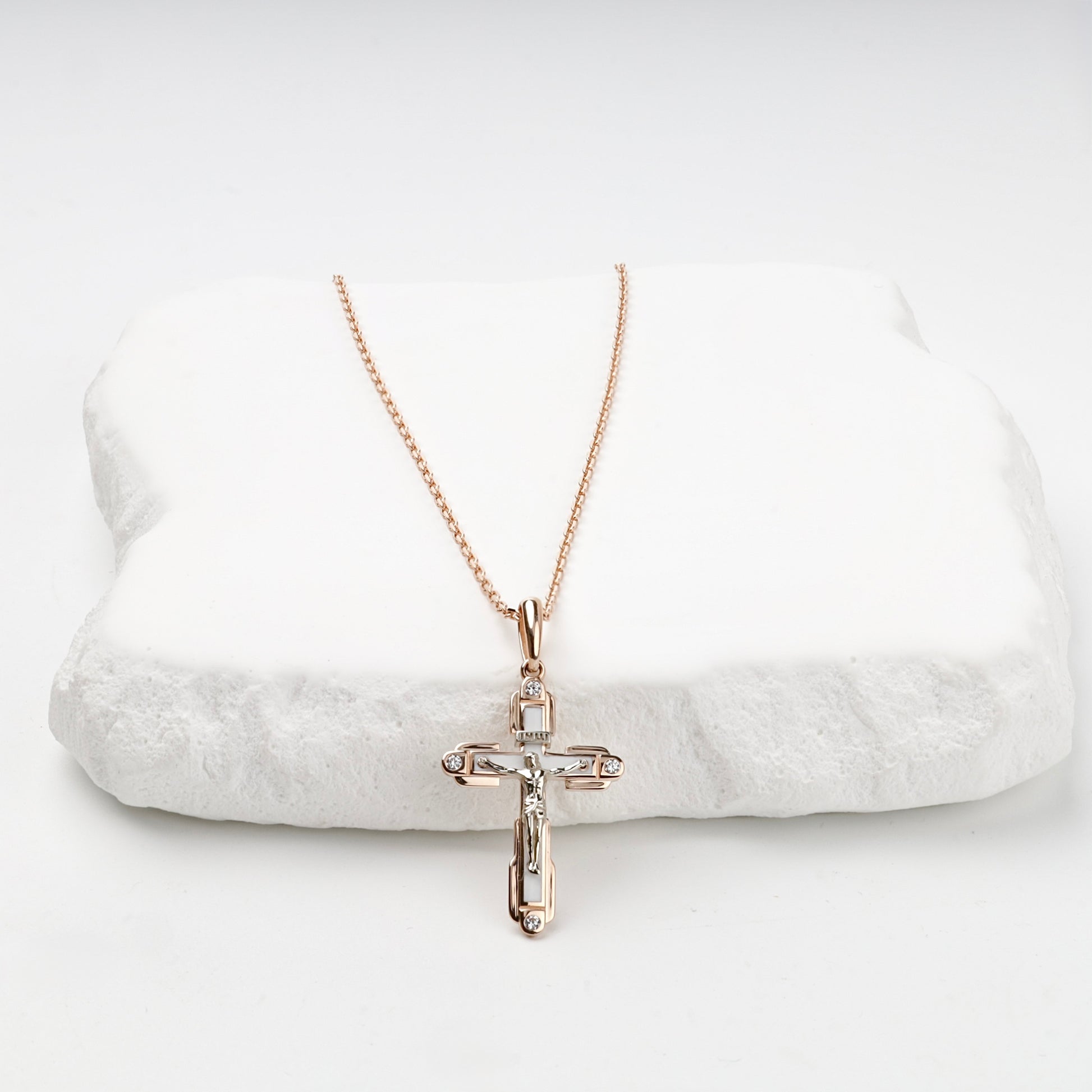 White enamel and cubic zirconia cross pendant, front view — Kabluchka