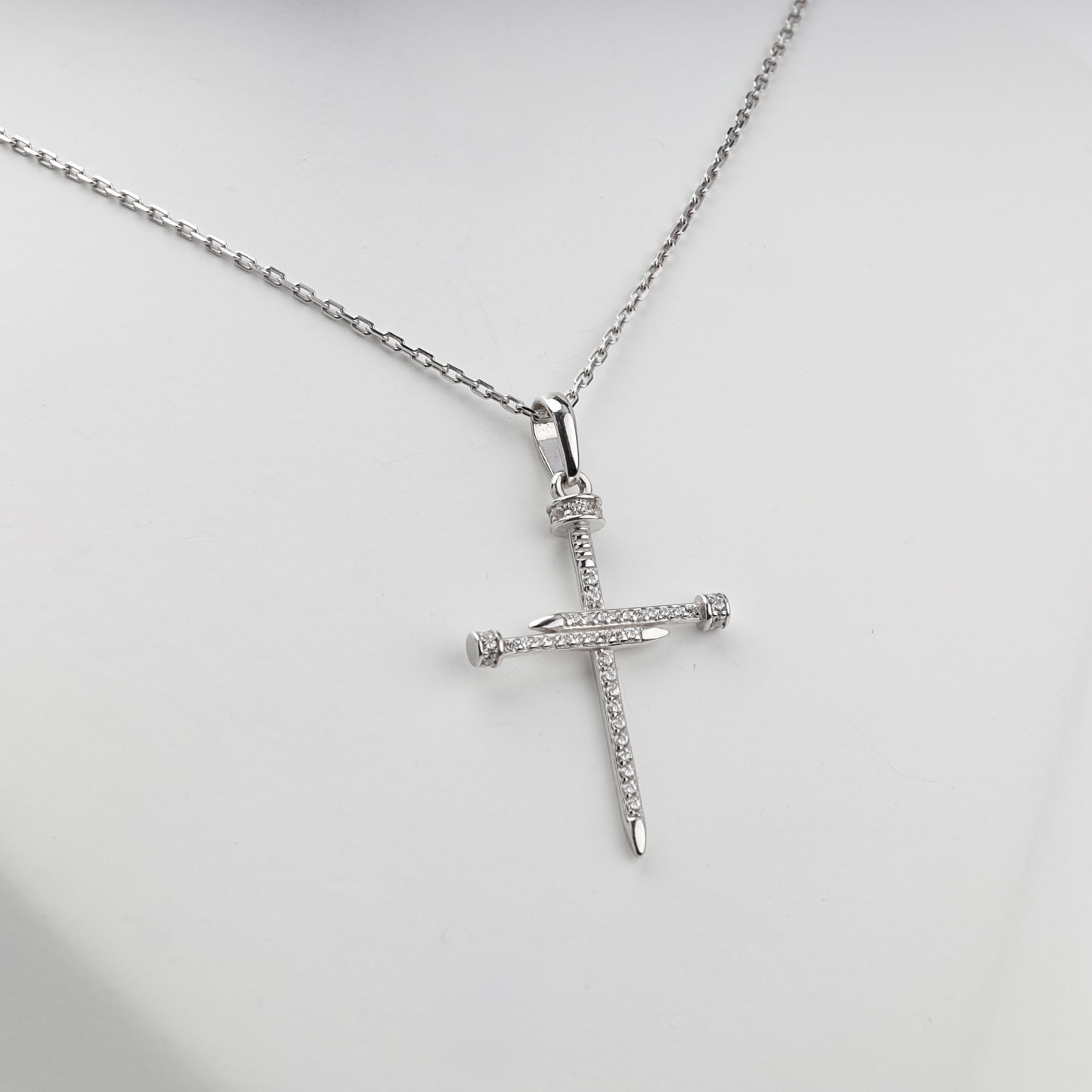 Silver 925 cubic zirconia nail cross pendant — front detail — Kabluchka