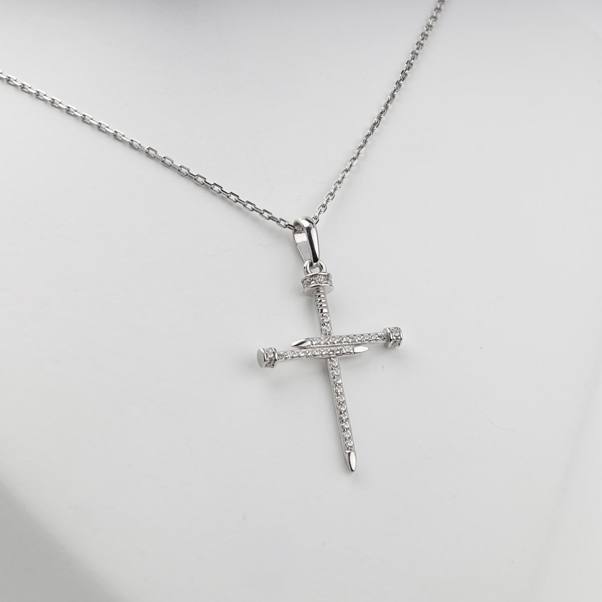 Silver 925 cubic zirconia nail cross pendant — front detail — Kabluchka