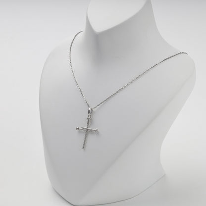 Silver 925 cubic zirconia nail cross pendant on display — Kabluchka