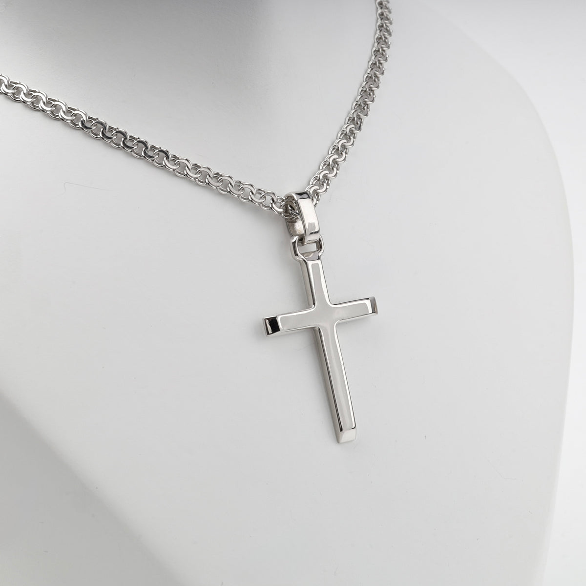 Silver 925 polished cross pendant with reverse inscription — angled view — Kabluchka