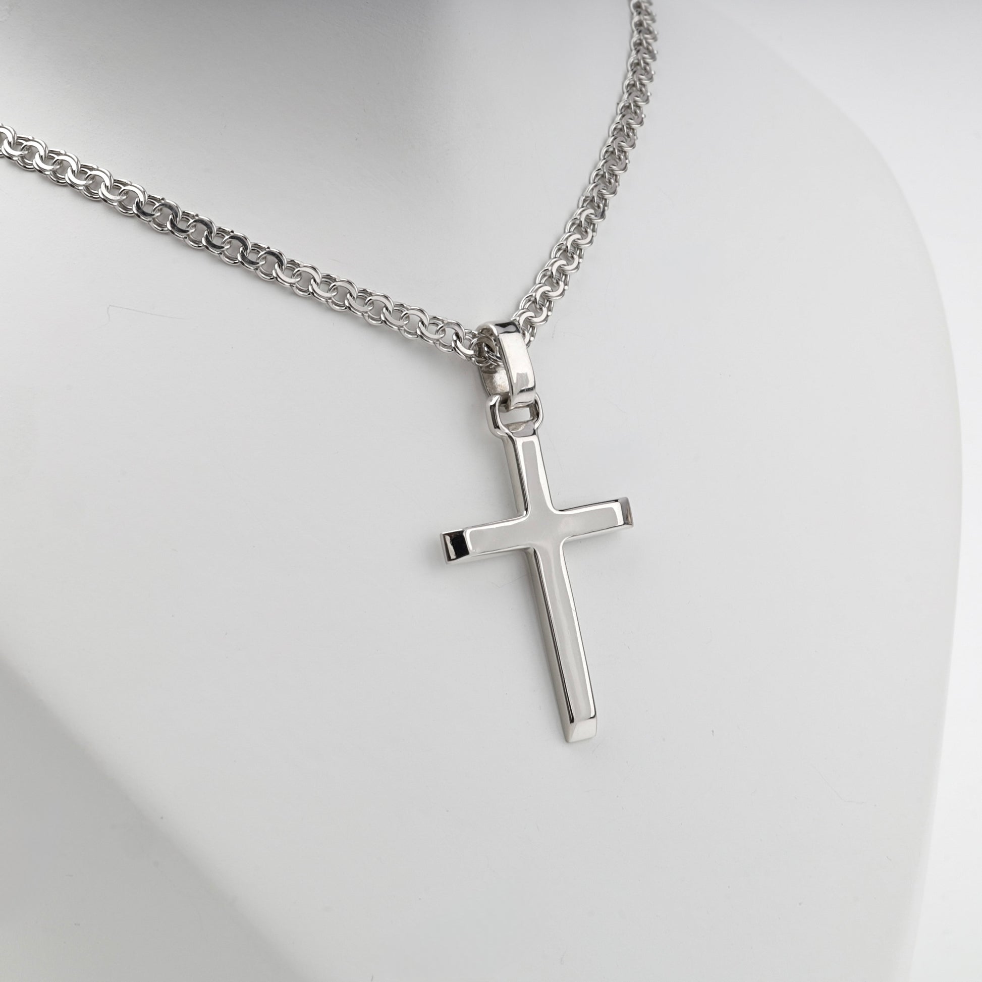 Silver 925 polished cross pendant with reverse inscription — angled view — Kabluchka