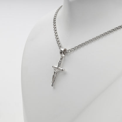 Silver 925 crucifix pendant showing smooth rounded cross arms