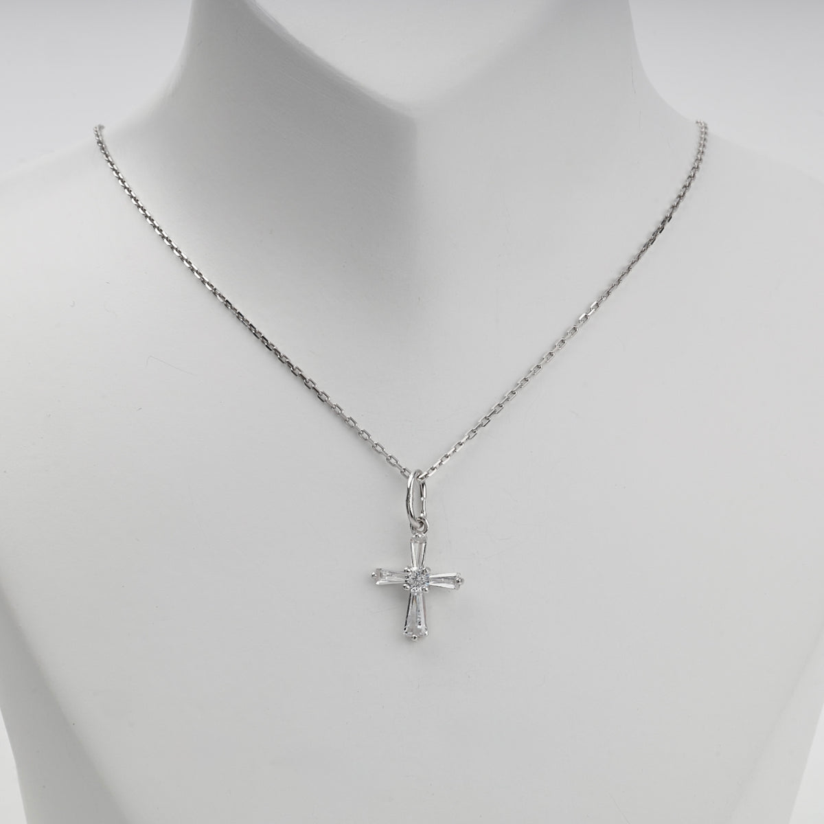 Silver 925 geometric cross pendant — angled chain view — Kabluchka