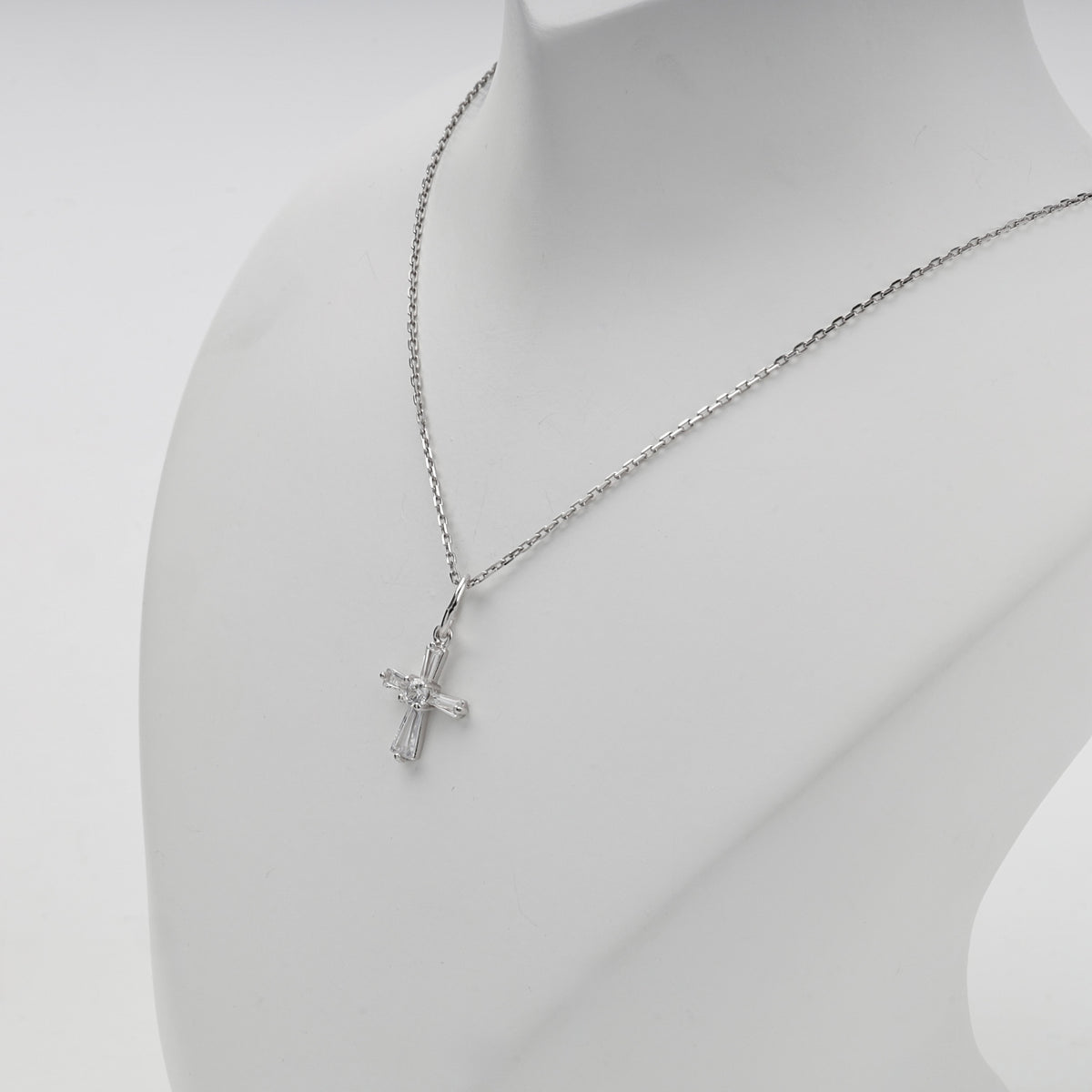 Silver 925 cubic zirconia cross pendant on display — Kabluchka