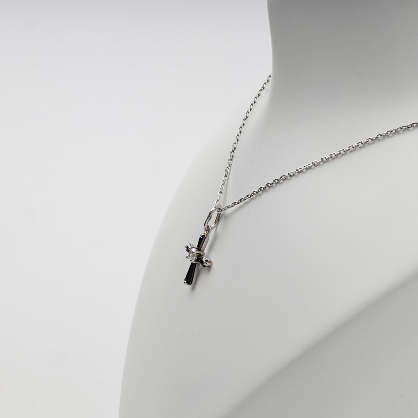 Silver 925 black and clear cubic zirconia cross pendant — angled view — Kabluchka