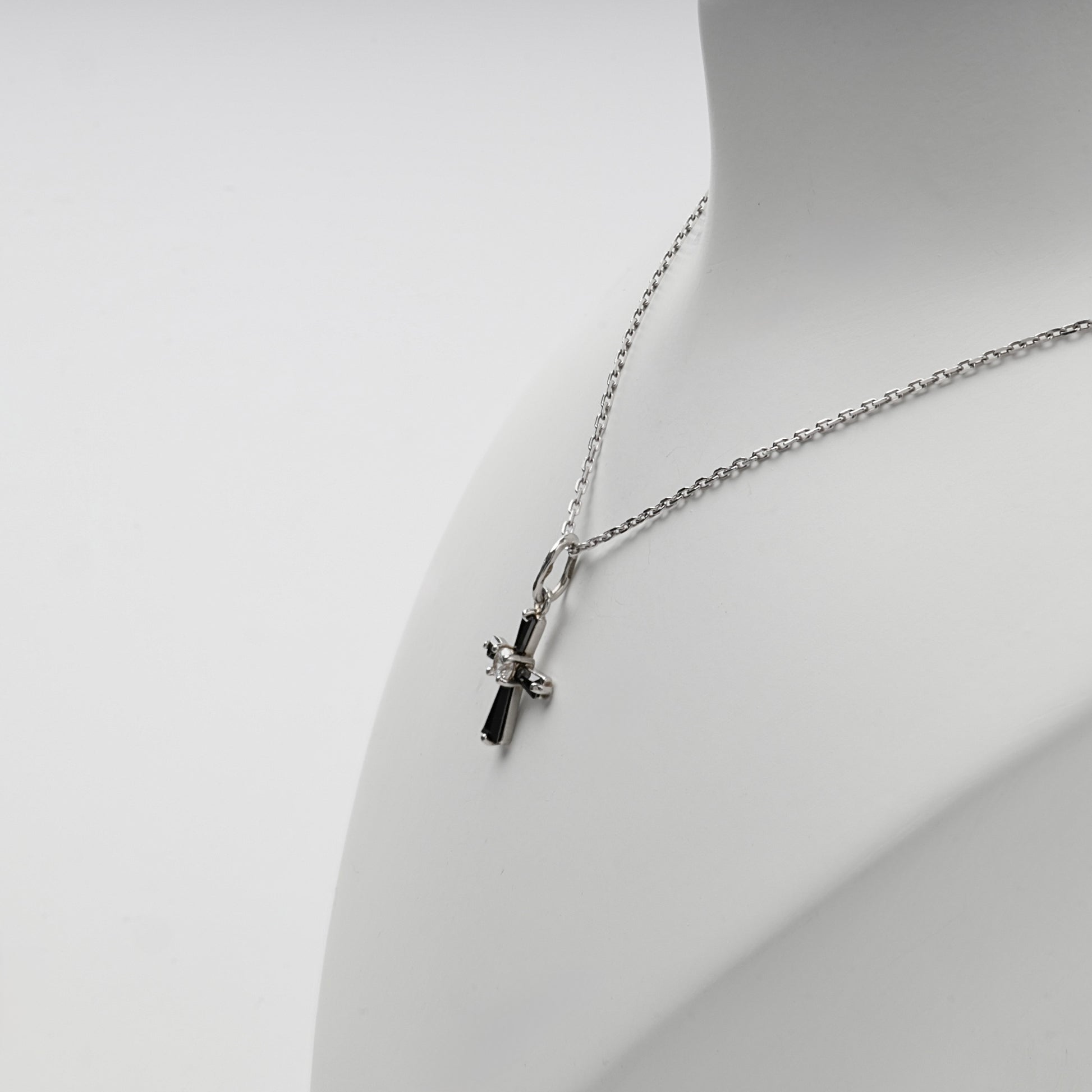 Silver 925 black and clear cubic zirconia cross pendant — angled view — Kabluchka
