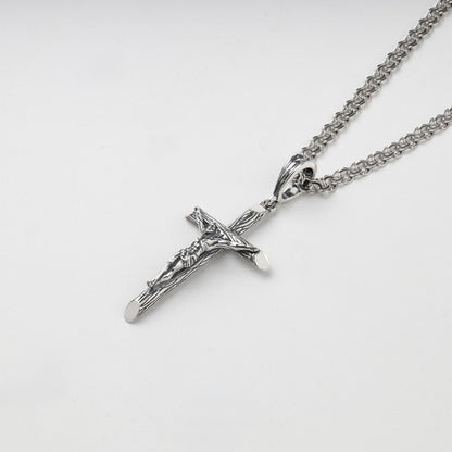 Silver 925 crucifix pendant showing darkened recessed details