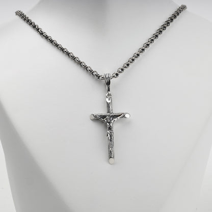 Textured silver crucifix pendant with sculpted Jesus figure
