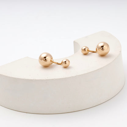 Rose Gold 585 Double Ball Drop Earrings pair on display — Kabluchka