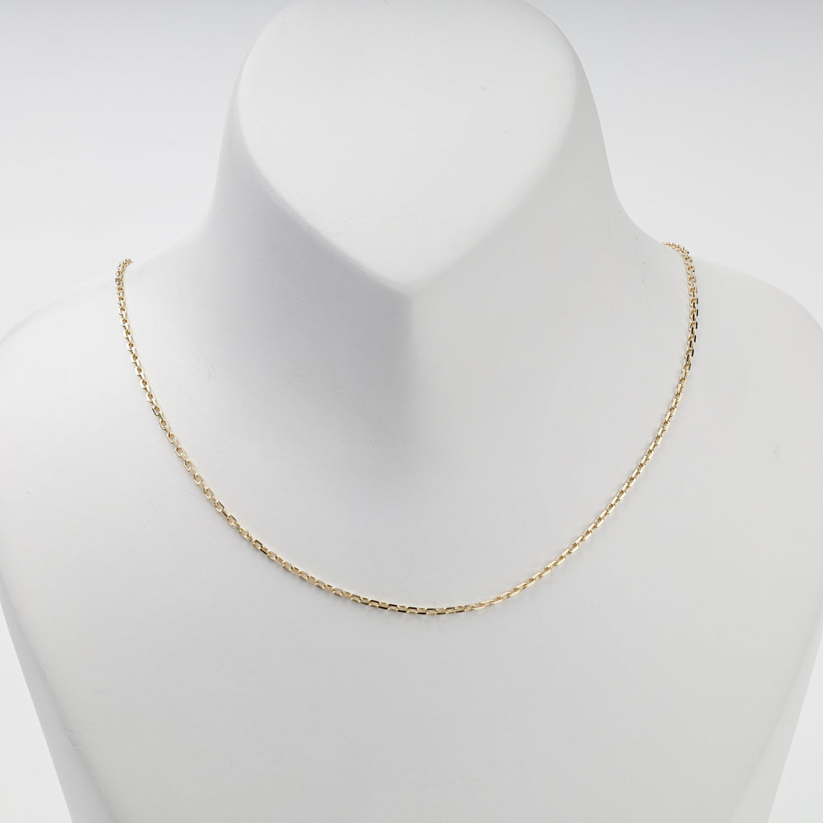 14K yellow gold cable chain necklace displayed at 40 cm length