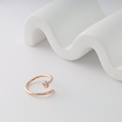 Rose gold nail bypass ring front view - Kabluchka