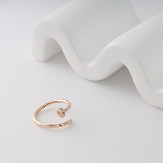 Rose gold nail bypass ring front view - Kabluchka