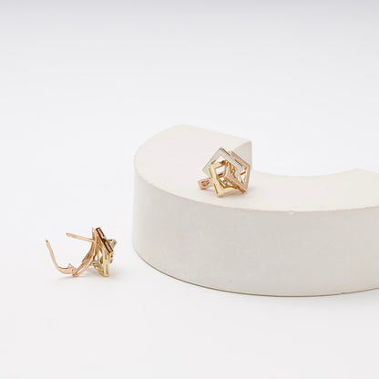 Gold 585 geometric cube earrings on display — Kabluchka