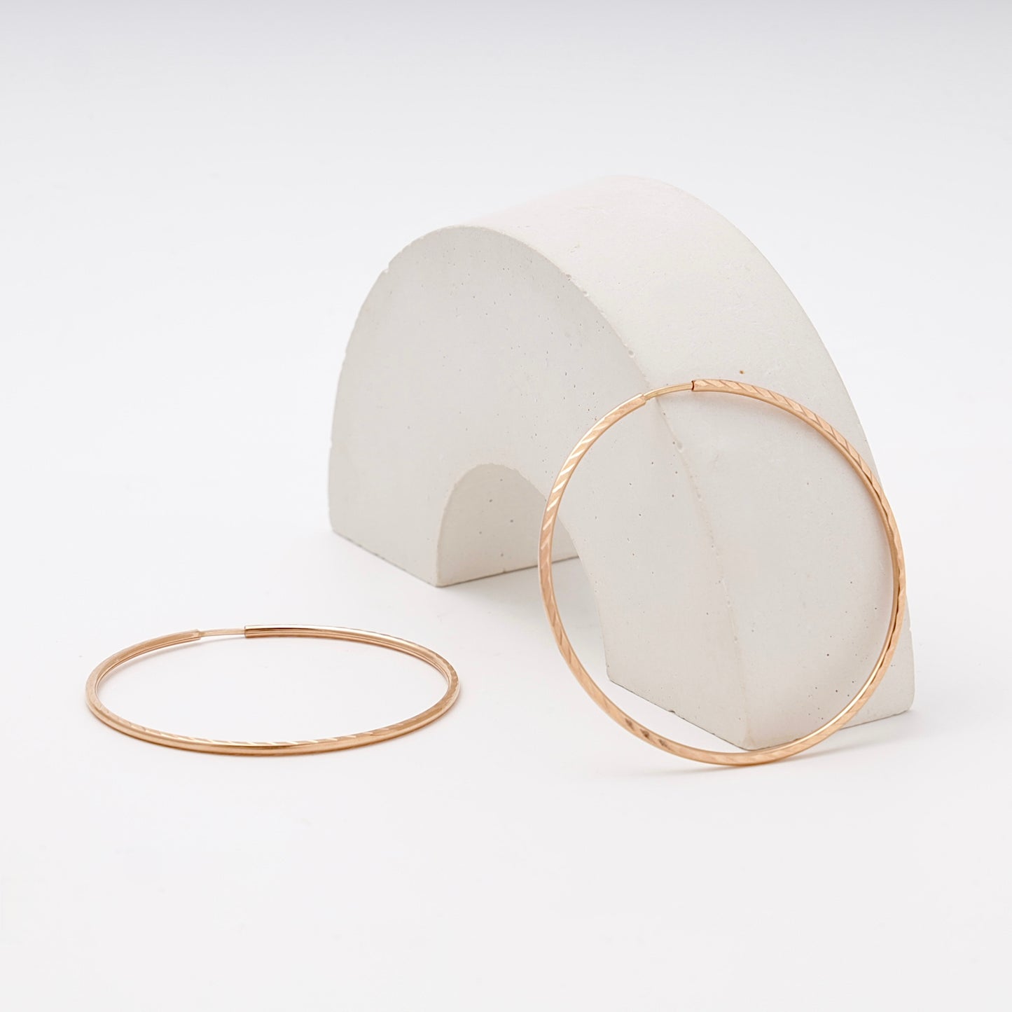 Rose Gold 585 Diamond-Cut Hoop Earrings 48 mm — on stand — Kabluchka