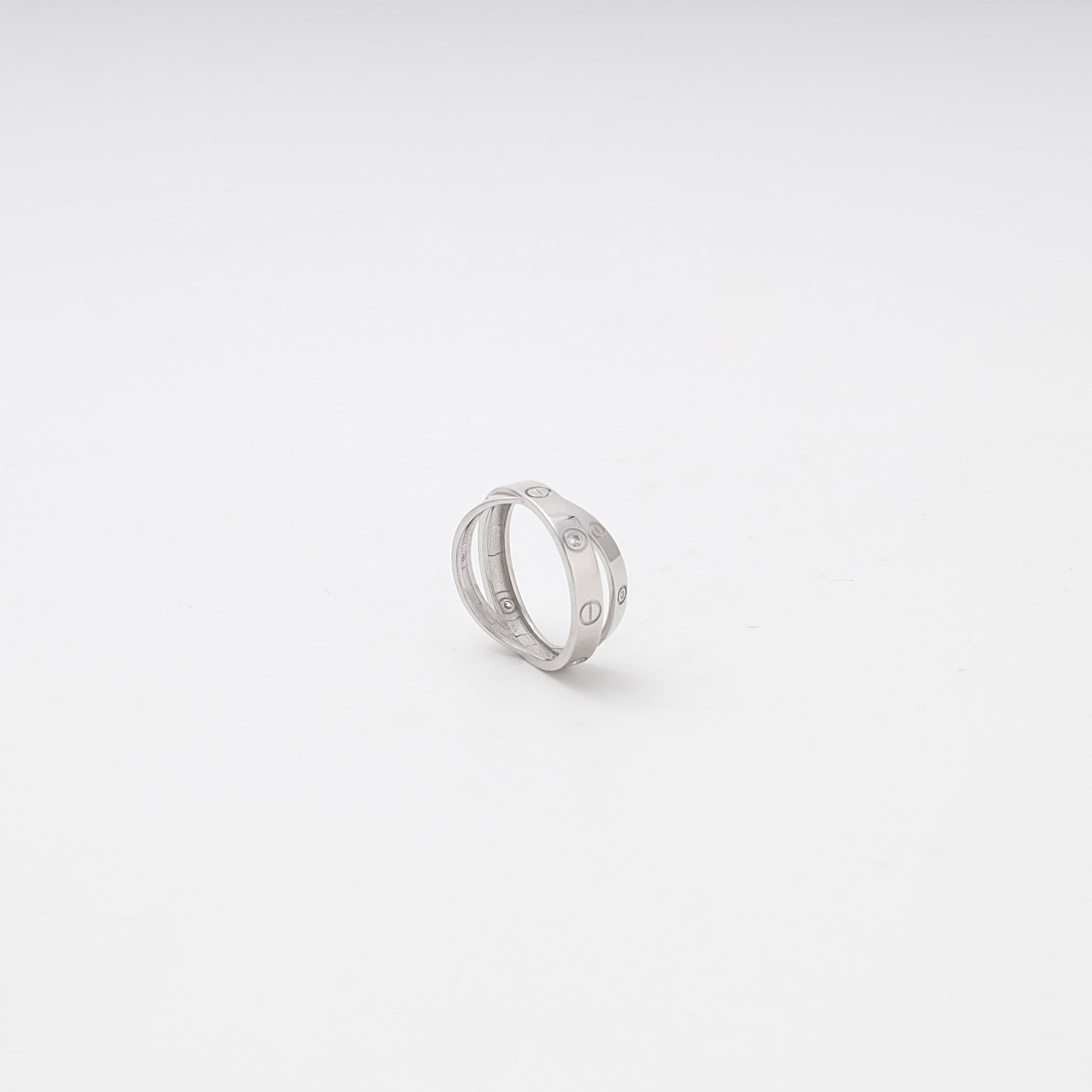 Silver 925 Crossover Love Ring with CZ flat lay — Kabluchka