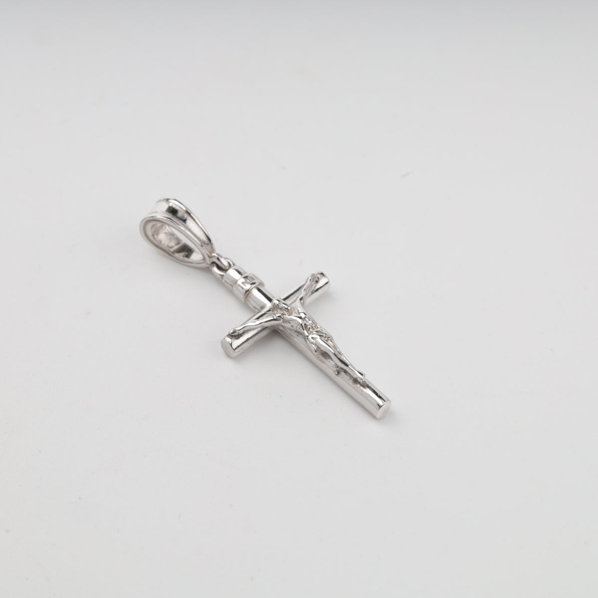 Silver 925 polished crucifix pendant, front view