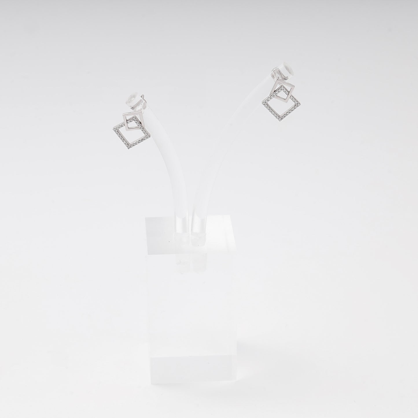 White gold 585 double square stud earrings with CZ on display stand — Kabluchka