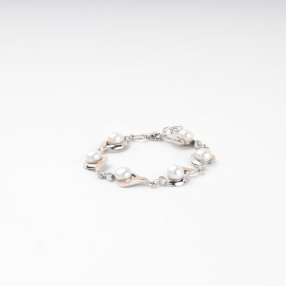 Pearl and cubic zirconia bracelet with lobster clasp — side view — Kabluchka