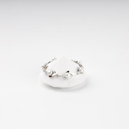 Rhodium-plated Silver 925 and Gold 375 pearl and cubic zirconia link bracelet — front view — Kabluchka