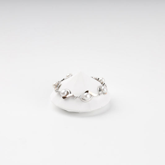 Rhodium-plated Silver 925 and Gold 375 pearl and cubic zirconia link bracelet — front view — Kabluchka
