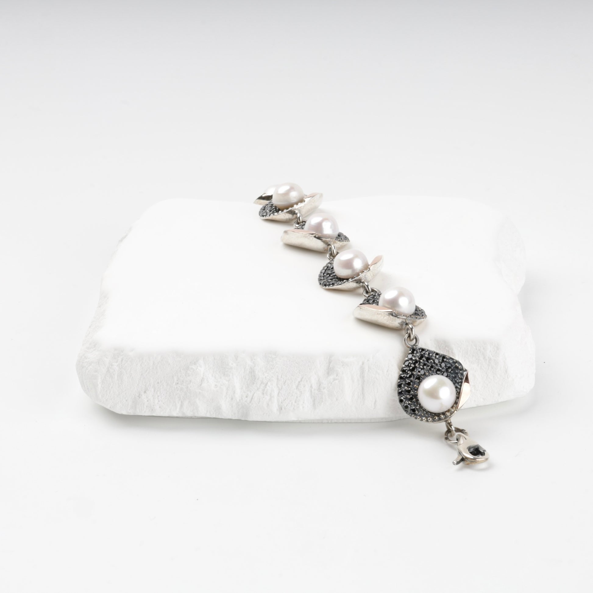 0409 pearl and cubic zirconia bracelet shown open