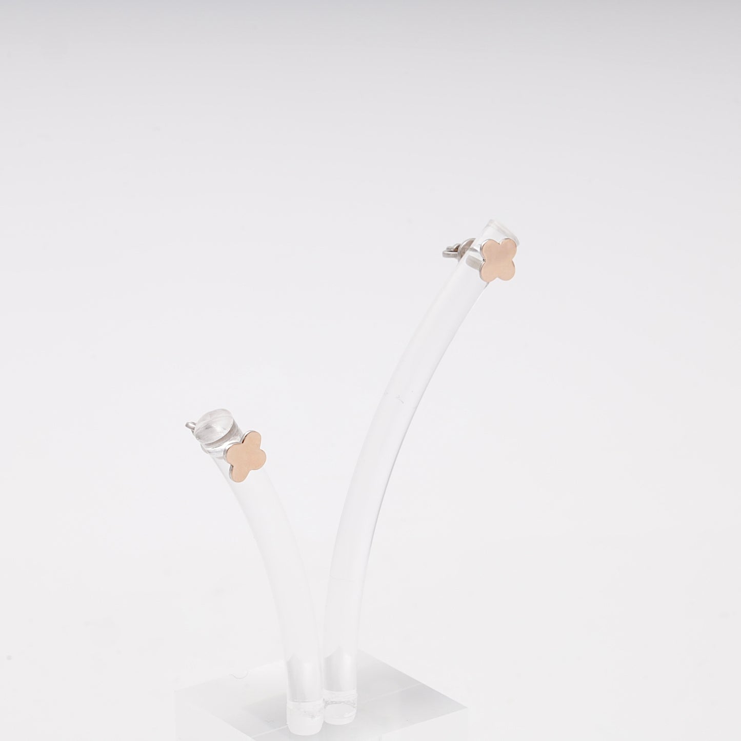 Silver 925 clover stud earrings on display stand — Kabluchka