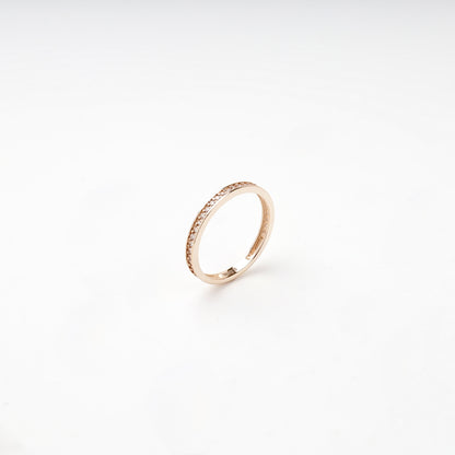 Rose gold 585 slim cubic zirconia band ring, angled view — Kabluchka