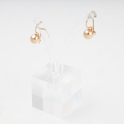 Rose Gold 14K polished ball earrings on display stand